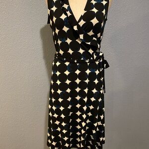 Leota Black and White Sleeveless Wrap Dress